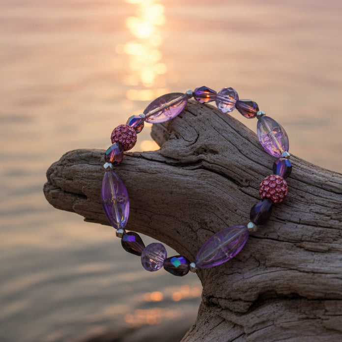 Necklace with multicolored beads on a gray background