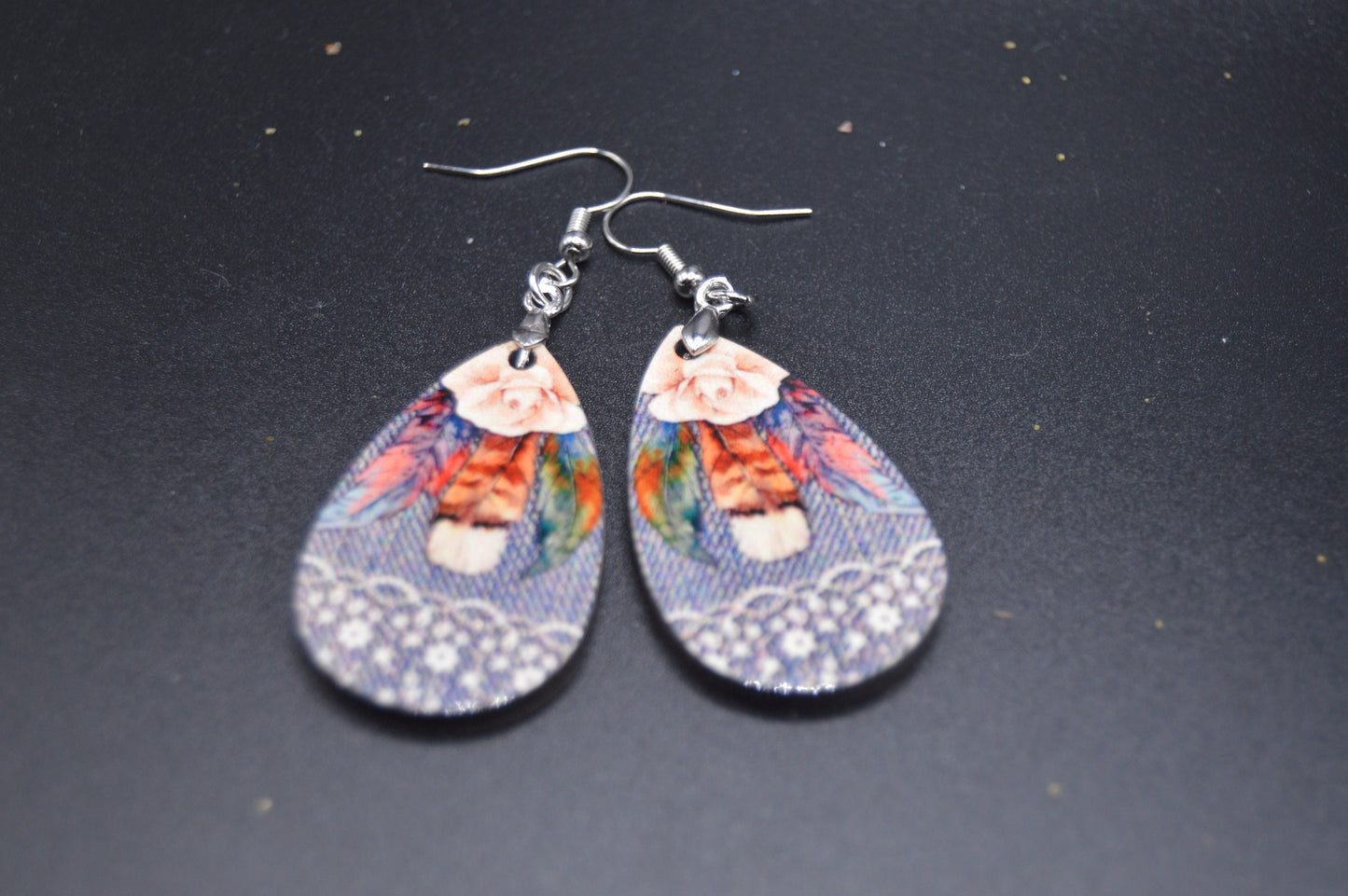 Western-Style Earrings featuring denim and lace, feathers and a single rose