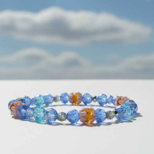 Colorful beaded bracelet on a plain background