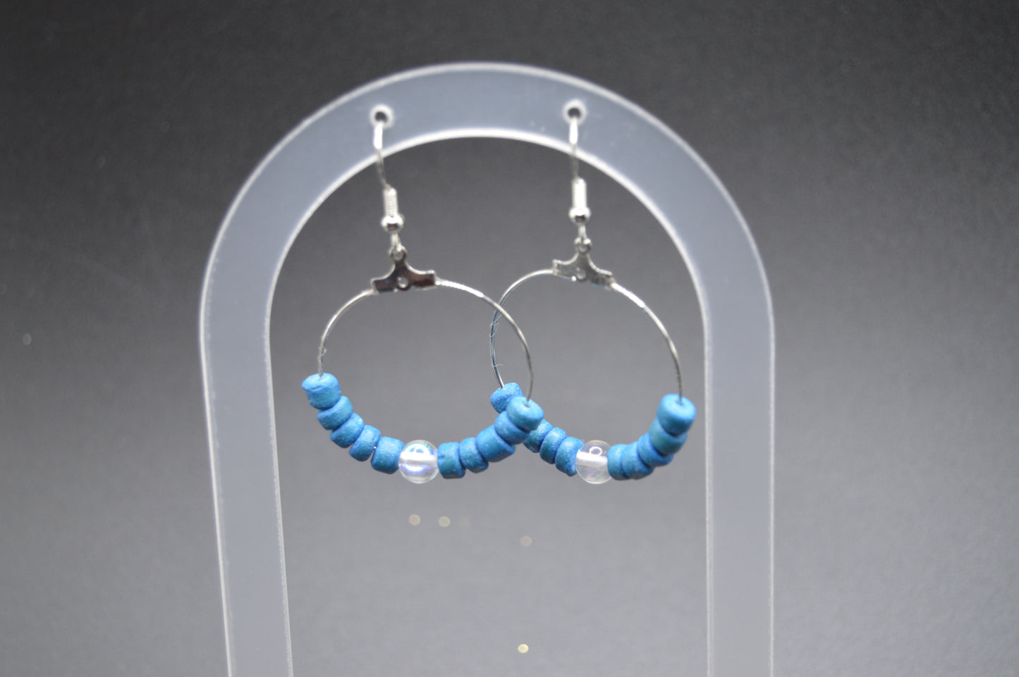 Silver Hoop Earrings featuring hand dyed coconut shells and rainbow glass.