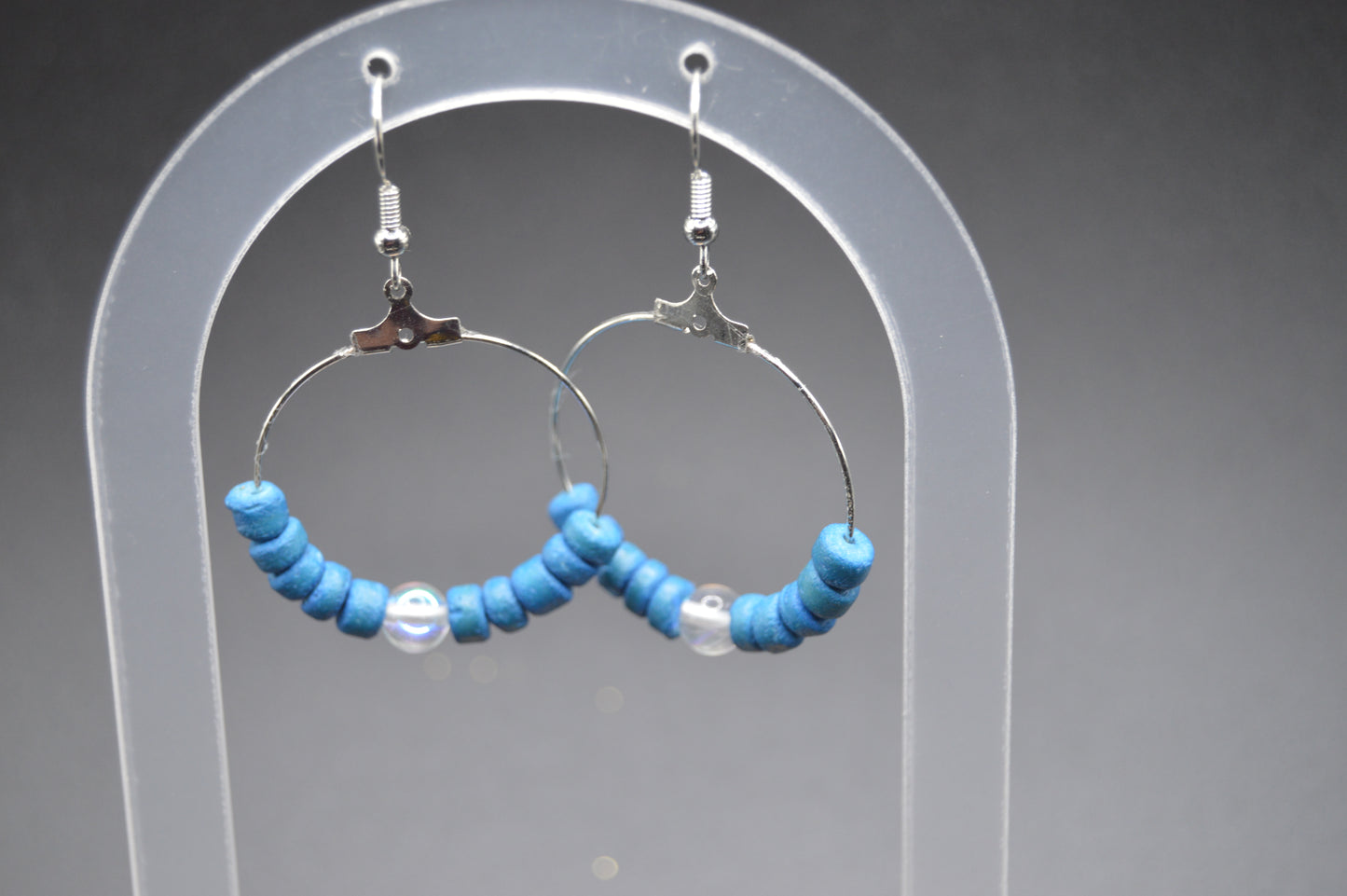 Silver Hoop Earrings featuring hand dyed coconut shells and rainbow glass.