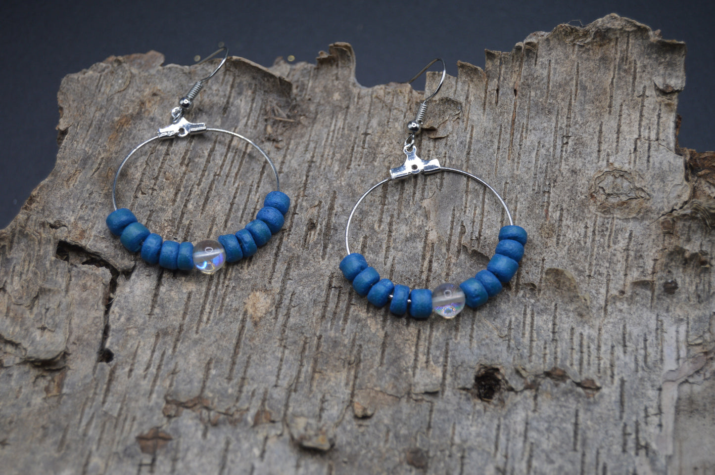 Silver Hoop Earrings featuring hand dyed coconut shells and rainbow glass.