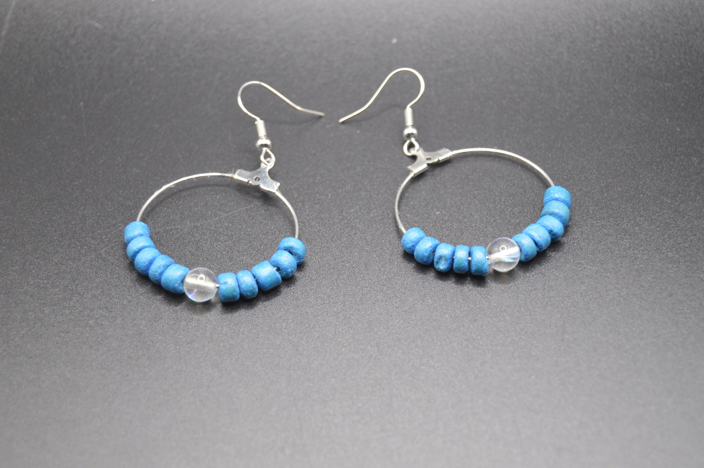 Silver Hoop Earrings featuring hand dyed coconut shells and rainbow glass.