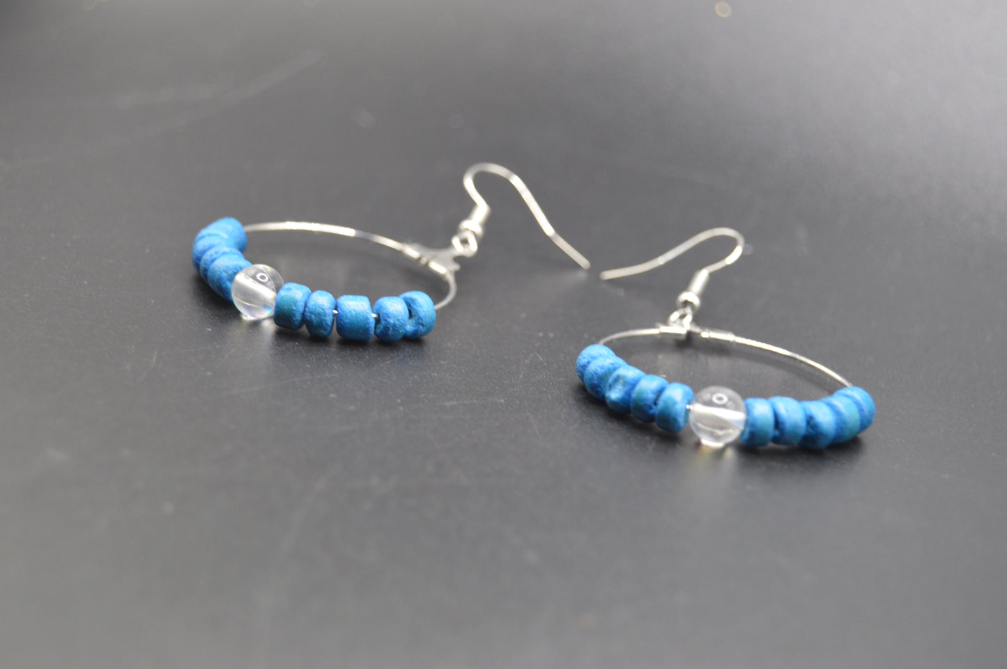 Silver Hoop Earrings featuring hand dyed coconut shells and rainbow glass.