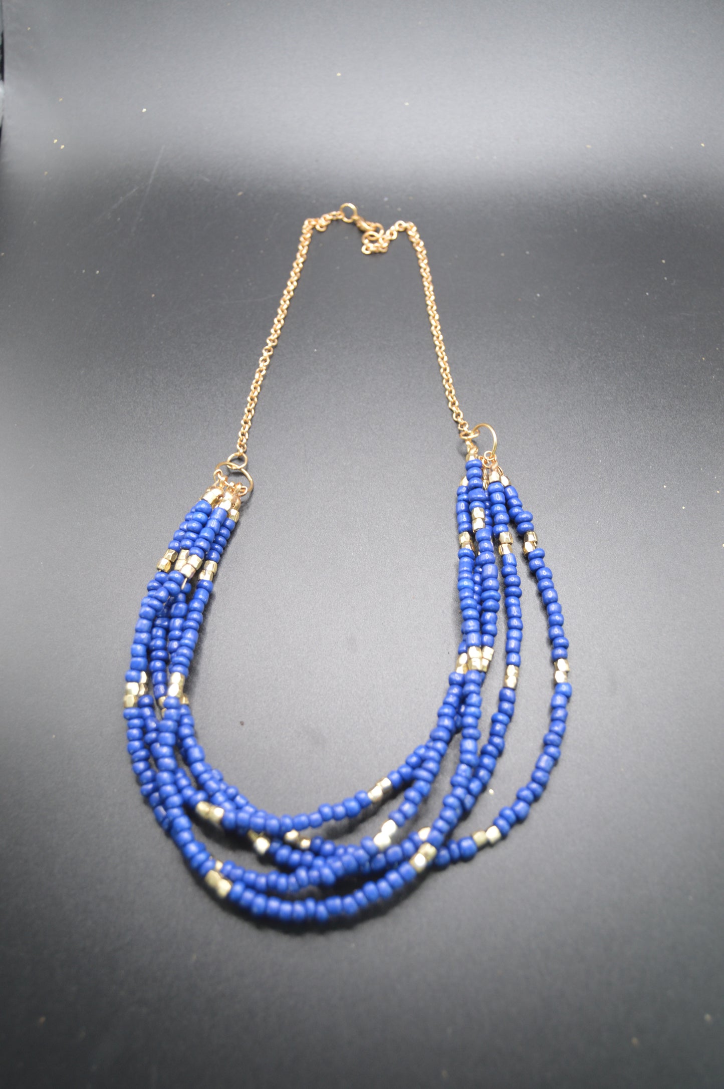 Handcrafted Blue Beaded Necklace with Gold Accents