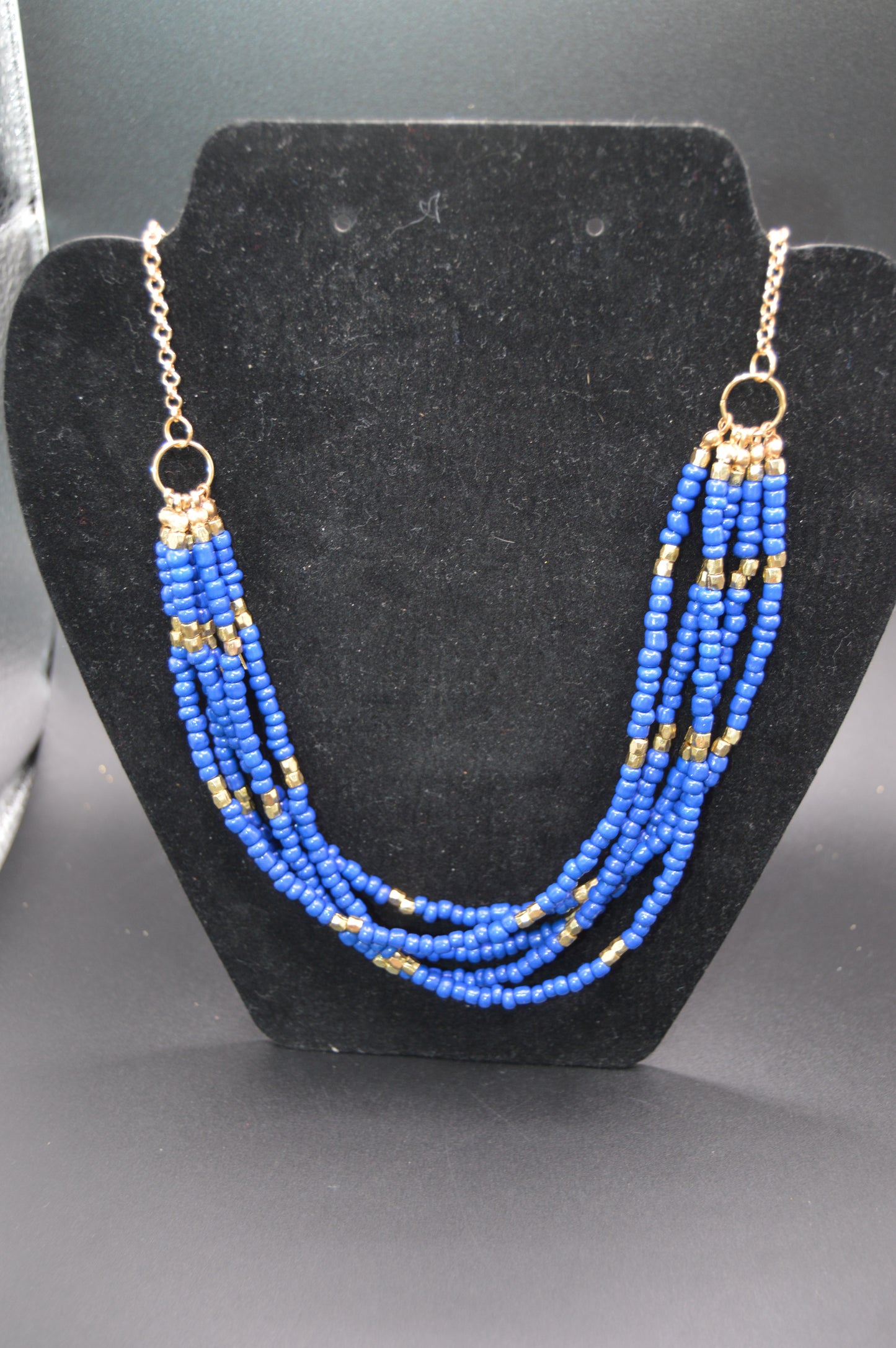 Handcrafted Blue Beaded Necklace with Gold Accents