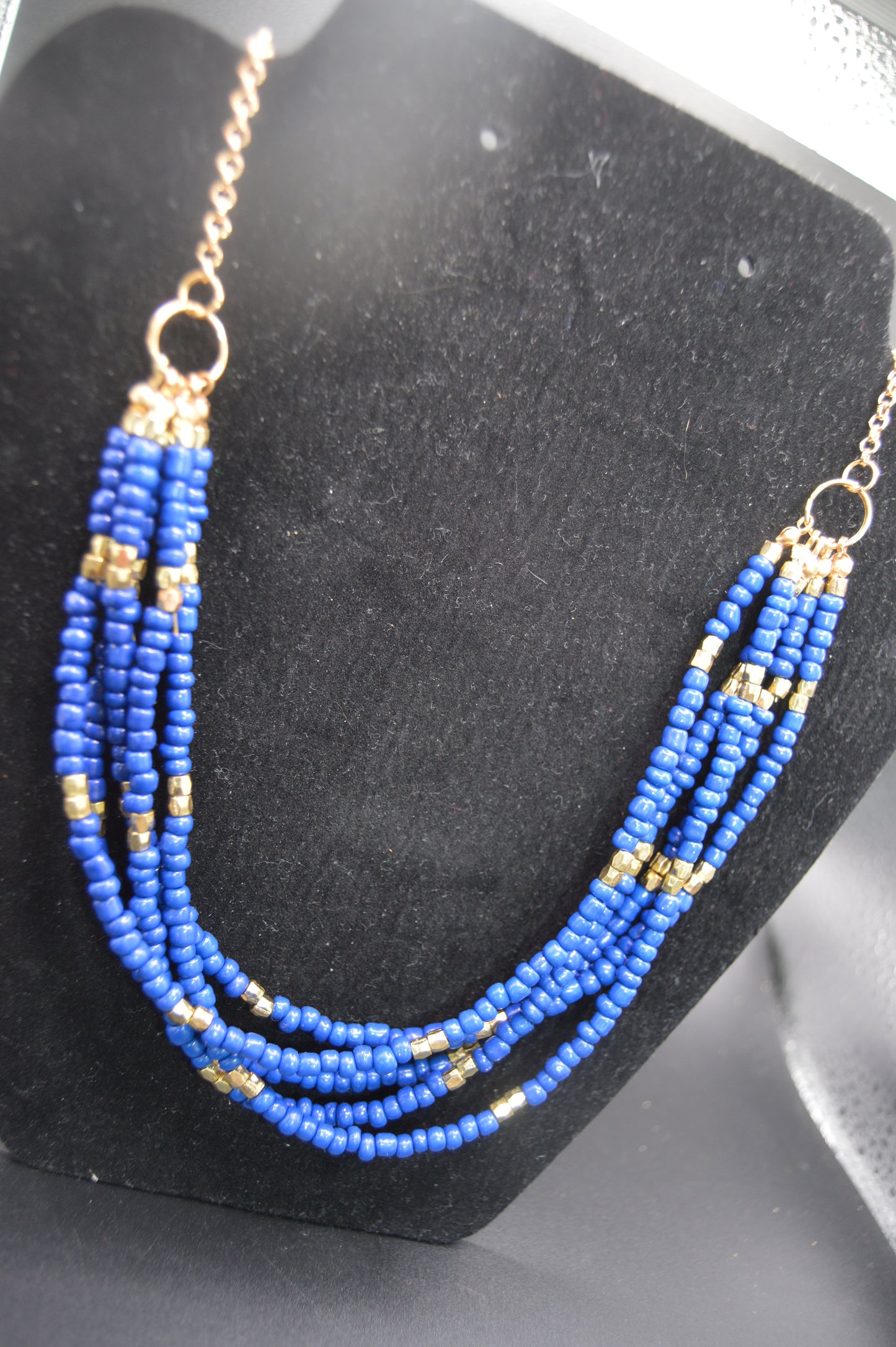 Handcrafted Blue Beaded Necklace with Gold Accents