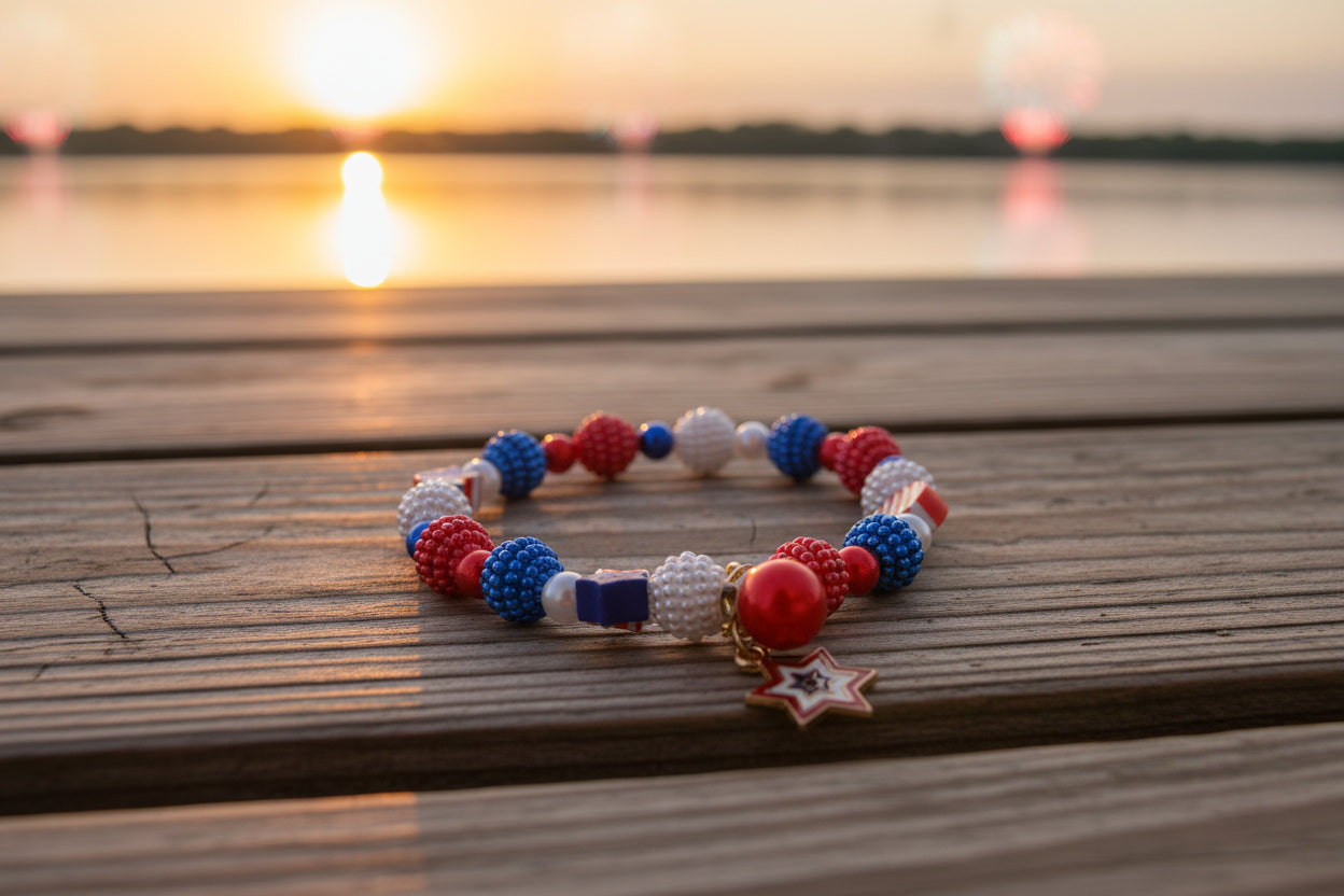 Beaded bracelet with red, blue, and white beads on a gray background