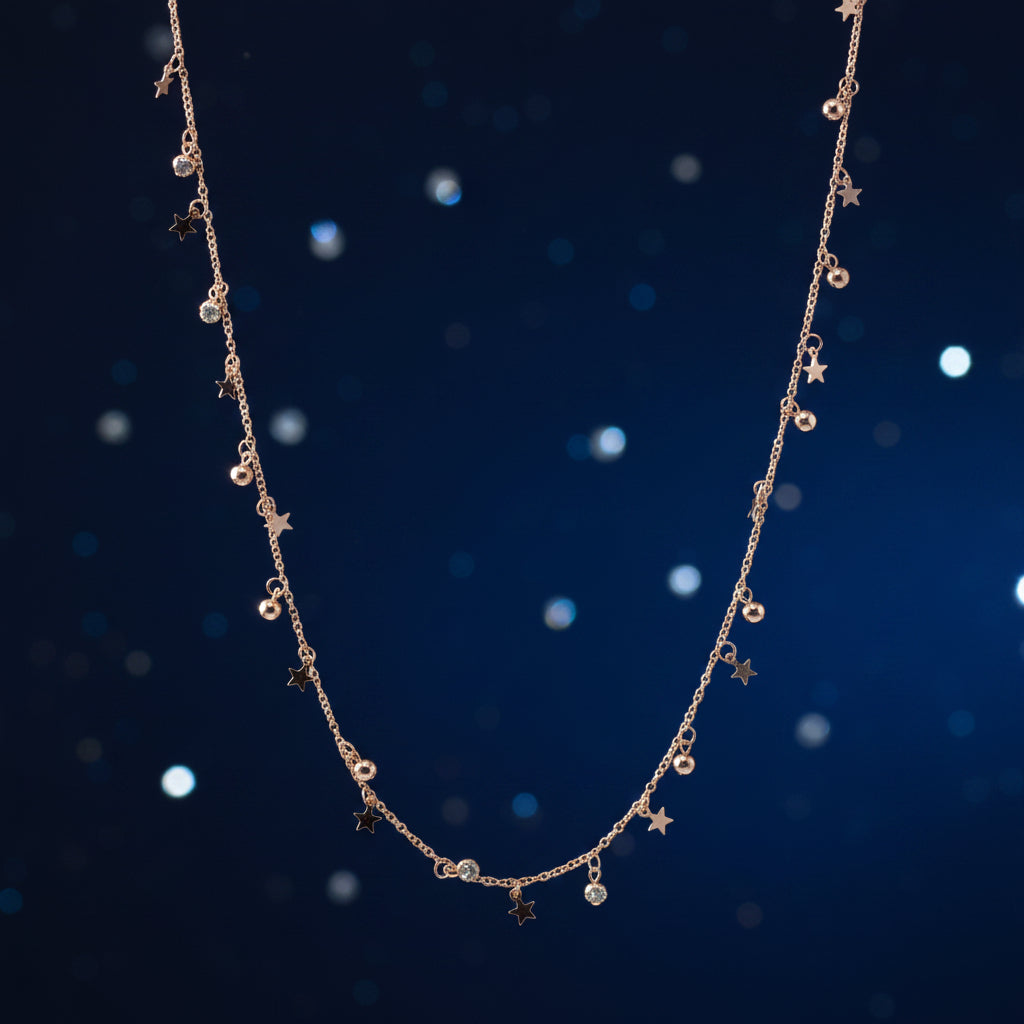 Rose gold necklace on a light gray background
