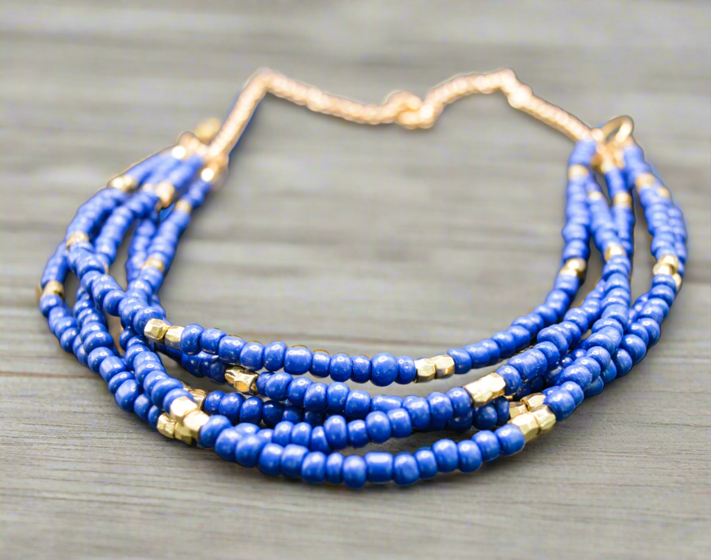 Handcrafted Blue Beaded Necklace with Gold Accents