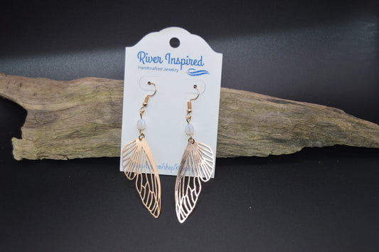 Heavenly Glow: Angel Wings Earrings with Pearl-Colored Crystal