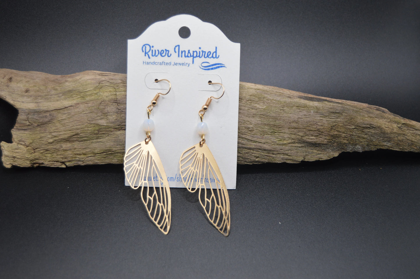 Heavenly Glow: Angel Wings Earrings with Pearl-Colored Crystal