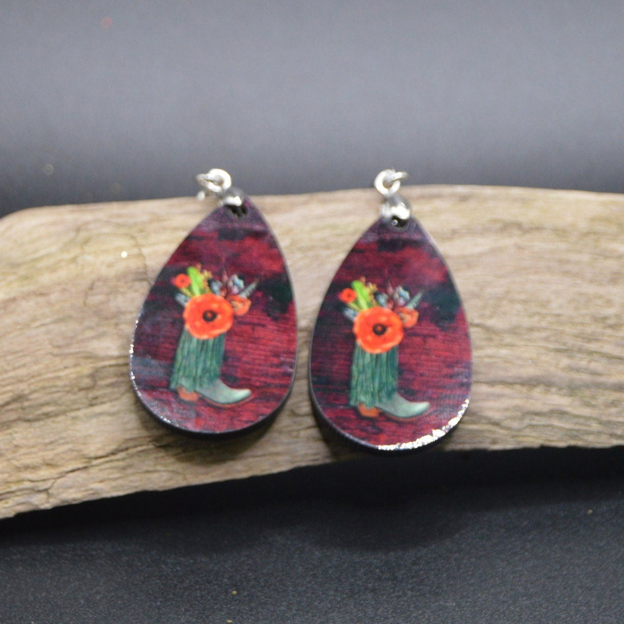 Western-Style Earrings featuring dazzling teal blue boots and a beautiful orange poppy.